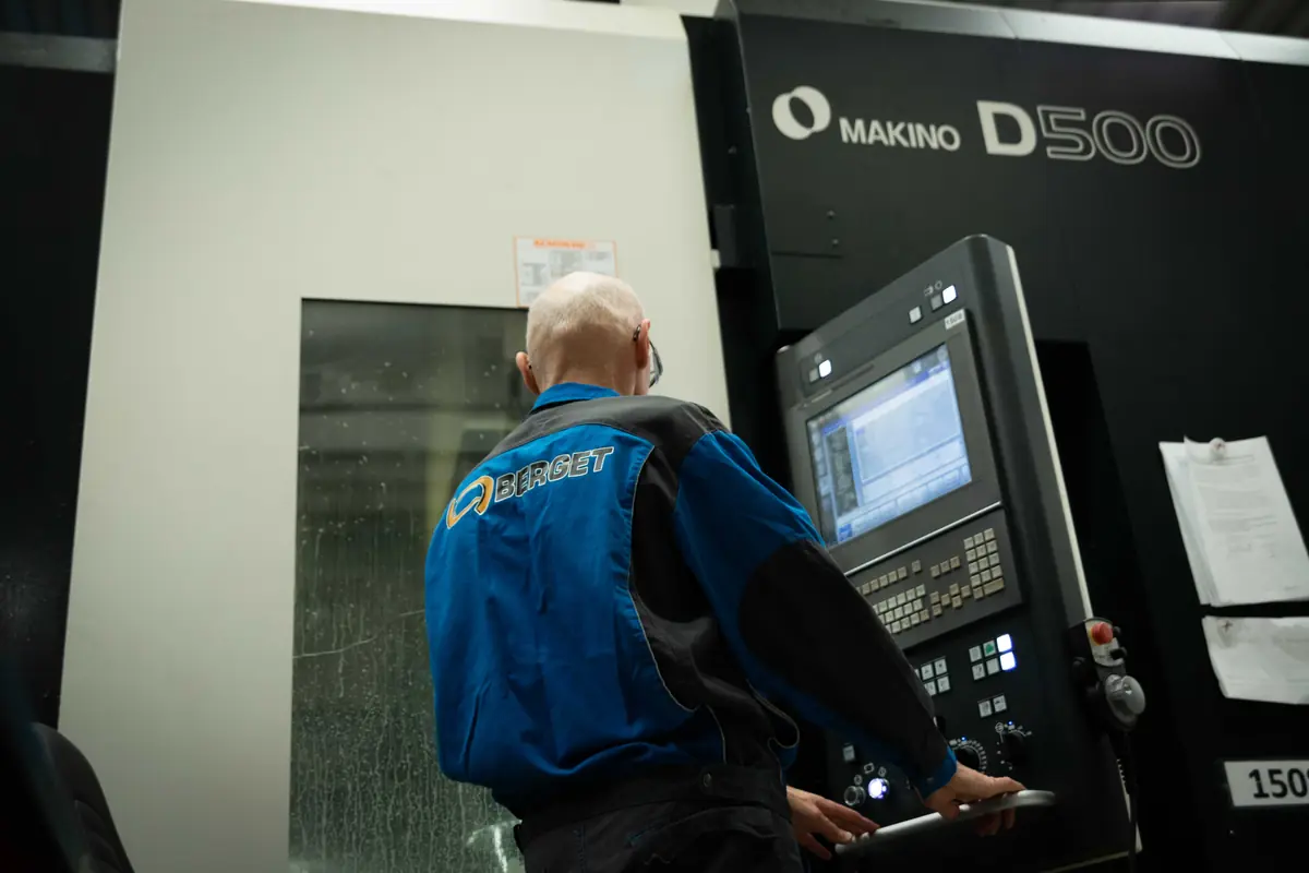 Operator at a Makino machining centre