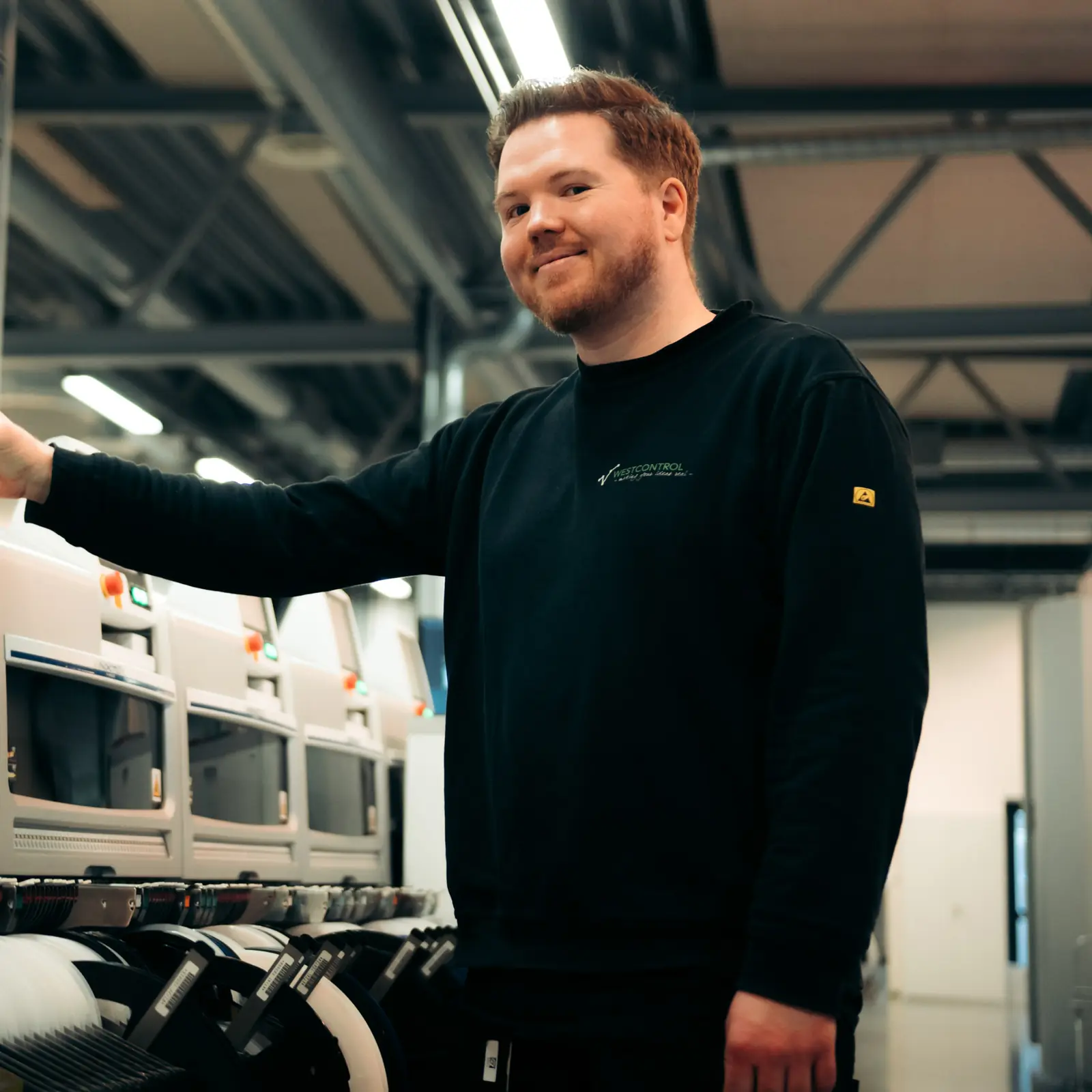 Operator at an SMT production line at Westcontrol